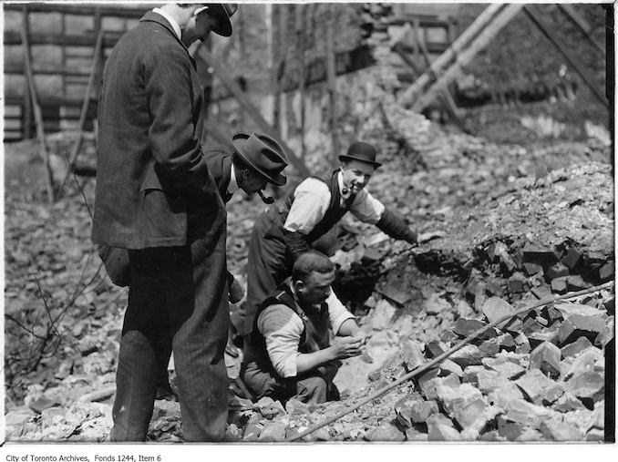 1906 - Curio seekers find souvenir in fire ruins.