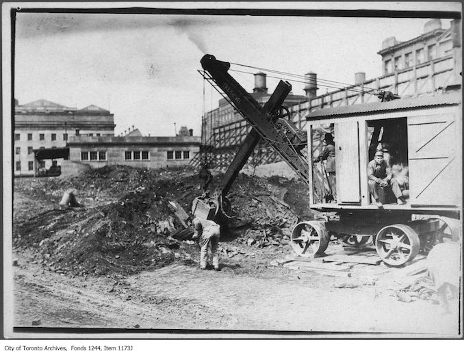 1908 - Excavating ruins of the Great Fire of 1904 for a new Customs House, Front Street at Yonge Street.