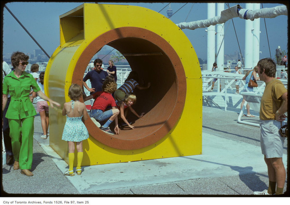 1976 - View of children playing in ride at Ontario Place