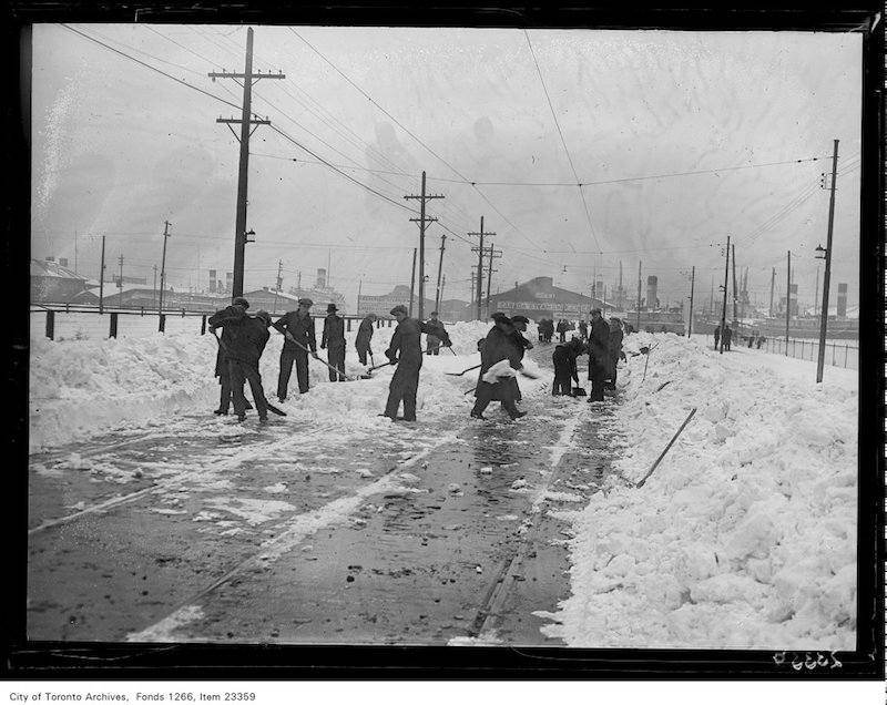 1931 - Snow clearing, men on lower Bay Street