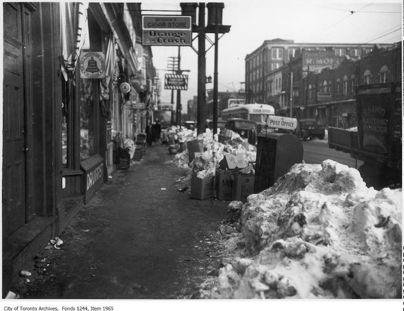 1938 - Garbage and snow on sidewalk