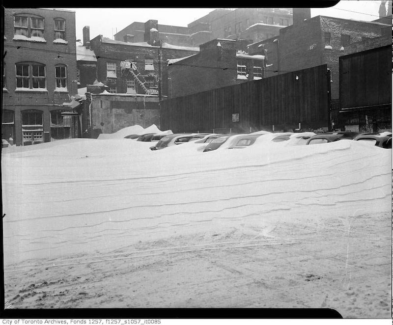 1944 - Dec 11 - Unidentified parking lot after a snow storm