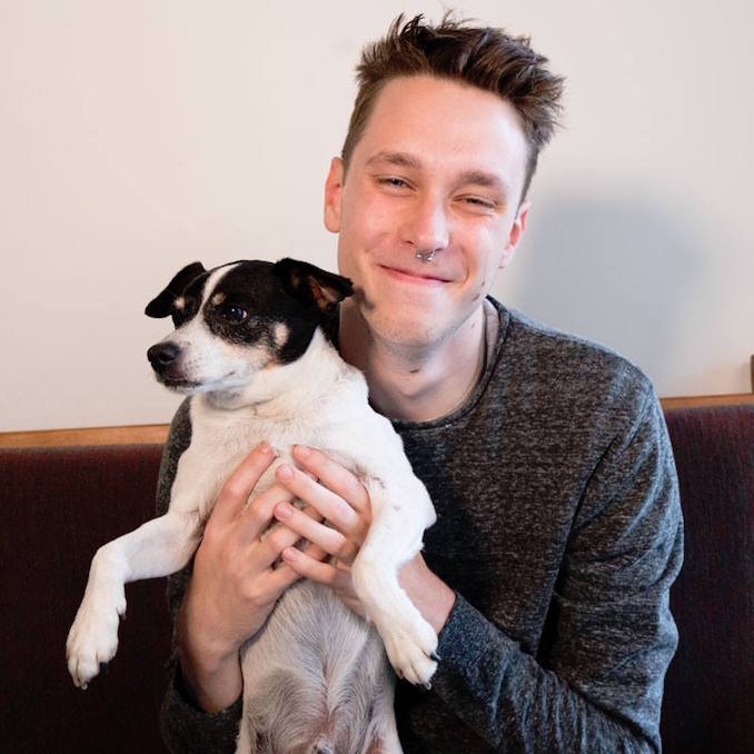 Aaron Moore with Jacko the dog at Charles Street Video