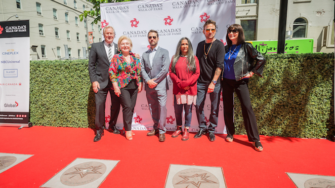 The 2016 Canada's Walk of Fame inductees Darryl Sittler, left to right,  Sara Waxman, wife of inductee Al Waxman, Jason Priestley, Deepa Mehta,  Corey Hart, and Jeanne Beker pose for a photo