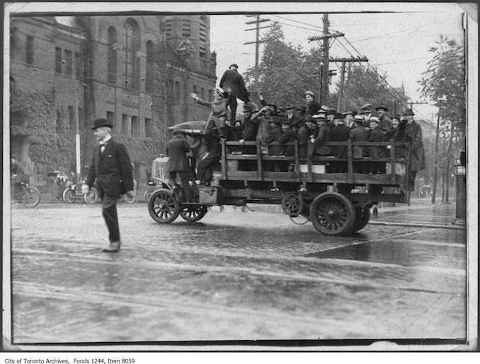 1919 - Truck carries passengers during streetcar strike, Spadina Avenue and College Street