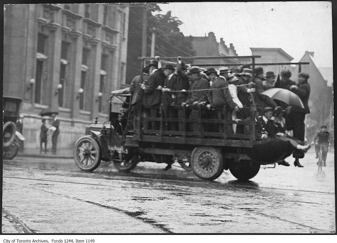 1920 - Truck used as transportation during streetcar strike, Spadina Avenue and College Street