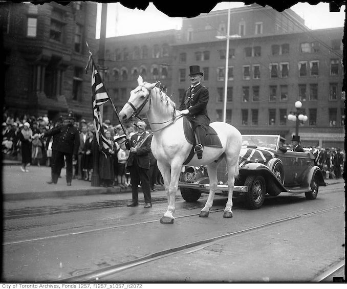 1932 - July 12 - Marshall W. H. Harper on horse in Orange Parade, Queen Street West