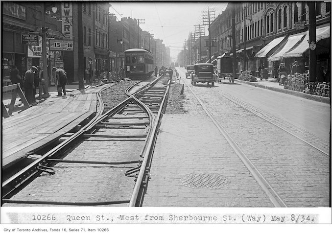 1934 - May 8 - Queen St, west, from Sherbourne St