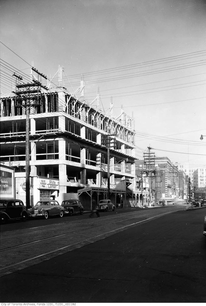 1951 - College Street east across Bay Street, British American Oil Building under construction