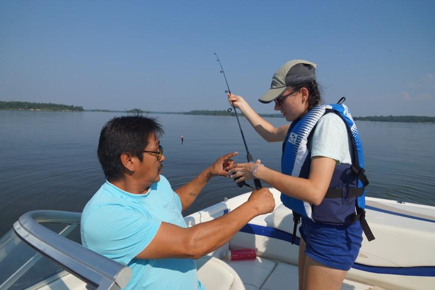 Teach for Canada teacher Laura Muntean, from Toronto, caught a fish during the Teach for Canada community visit to Big Grassy River First Nation in late July.