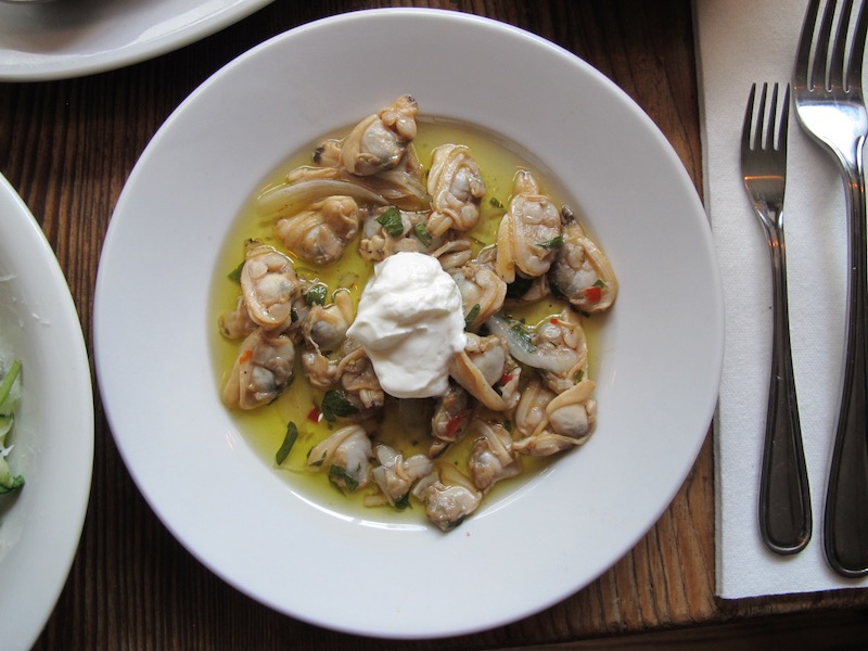 Pickled Clams; oil, vinegar, topped with sour cream