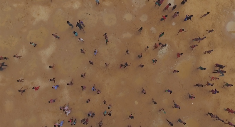 Children running in Human Flow doc. Kutupalong refugee camp in Bangladesh. - Get Woke