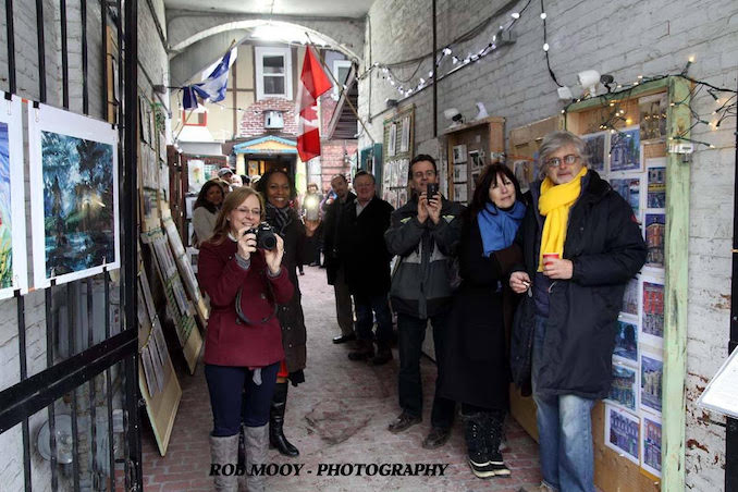 Getting a pic of The Town Crier announcing the opening of Froid'Art at Martello Alley