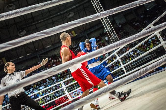 In addition to running a charitable organization and owning boxing gyms in Canada, Jennifer Huggins is an AIBA International Referee and Judge. Many of her assignments are to all male competitions, including the World Series of Boxing. [Photo Credit: Karim De La Plaine | Photo taken during the 2016 Men’s Elite Continental Olympic Qualifiers in Caracas, Venezuela]