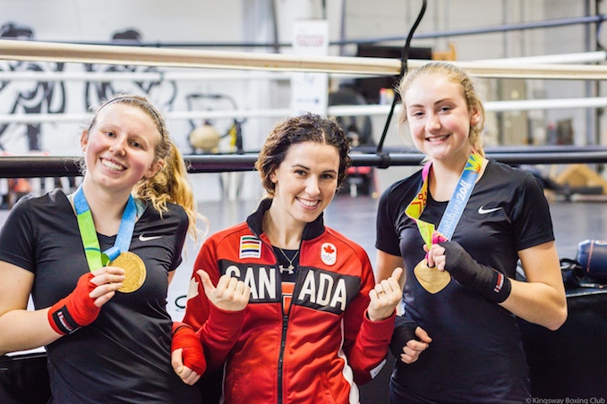 Mandy Bujold -  Only female boxer in history to win 2 Pan American Games titles. Mandy also represented Canada at 51kg in 2016 Rio Olympic Games. [Photo Courtesy of Virgil Barrow Photography | (left to right) Maya Canham, Mandy Bujold, Julia Switzer). Photo taken from the Exclusive Girls Teens Boxing Program -- Kingsway Boxing Club in Toronto. Mandy frequently invests back into the sport by mentoring youth as one of Canada’s most accomplished ambassadors of boxing]