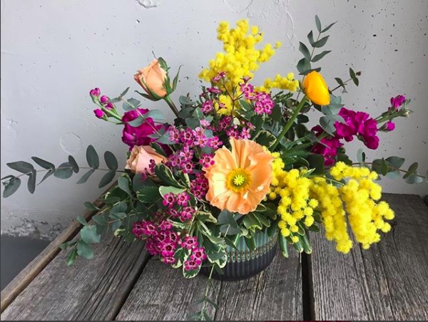 Yellow additions in a floral arrangement always make for a bright afternoon