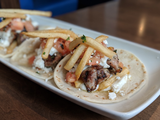 Greek Tacos: chicken souvlaki, tomatoes, feta, French fries, homemade tzatiki