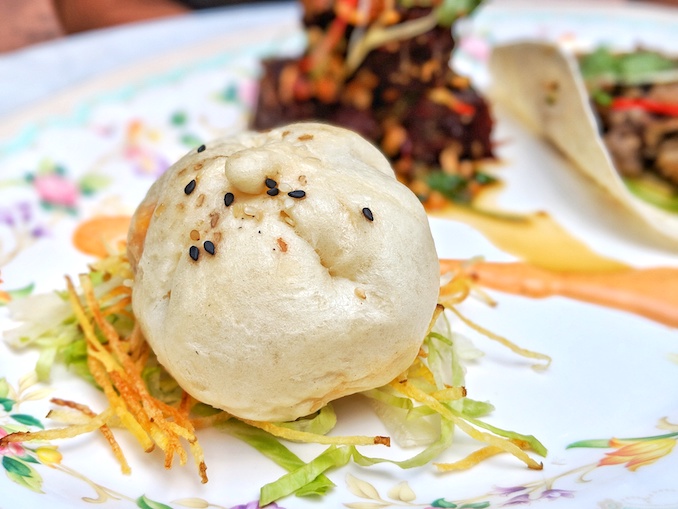 Assembly Chef's Hall - Big Mac Bao: In-house made bun stuffed with 90-day rib cap ground beef, real Canadian cheddar turned into processed cheese, and Vlasic pickles.