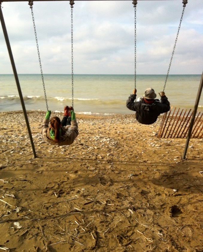 Kaitlyn Riordan - Kaitlyn and her mom swinging overlooking Lake Huron on Christmas Day, 2016