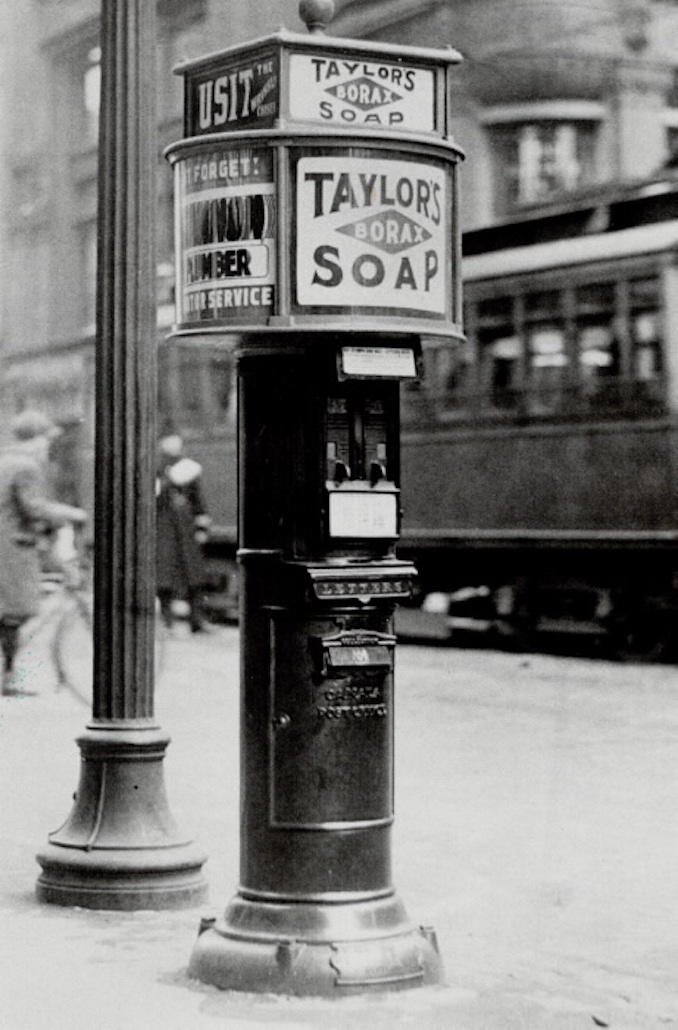 1916 - besides serving as letter drops; they also dispensed stamps and had miniature billboards on top. This photo; taken at Yonge and Richmond Sts. in 1916