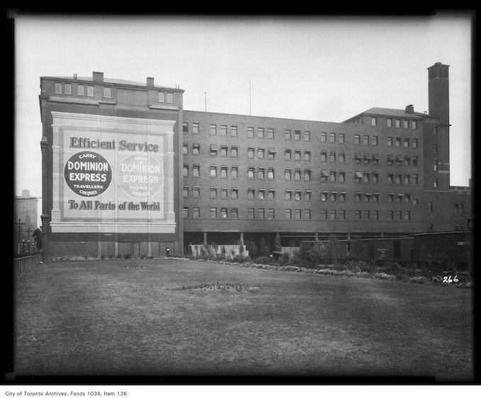 vintage advertising toronto - 1926 - Commercial building with Dominion Express Advertisement on wall