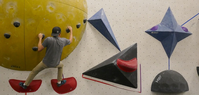 rock climbing - Joel levy bouldering across a lateral traverse at Hub Climbing in Markham