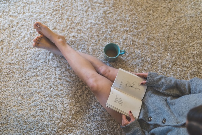 My bedroom is my sanctuary. It’s where I read, write, sleep (and sometimes eat). Here, I am reading one of my favourite authors, Rupi Kaur, who has inspired much of the poetry I write.