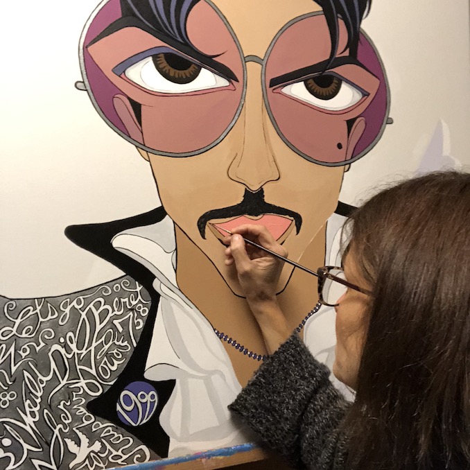 Michelle Vella painting her WIDE BIG EYES portrait of Prince.