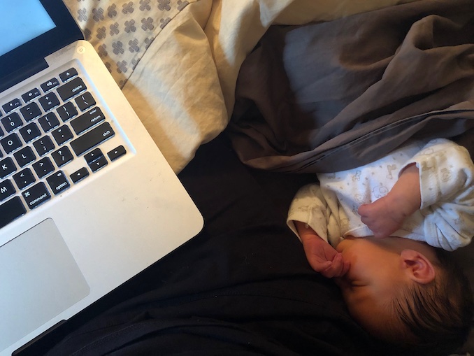What I'm mostly doing right now: getting a bit of work done for upcoming projects with my newborn daughter, Geneva, snoozing beside me.