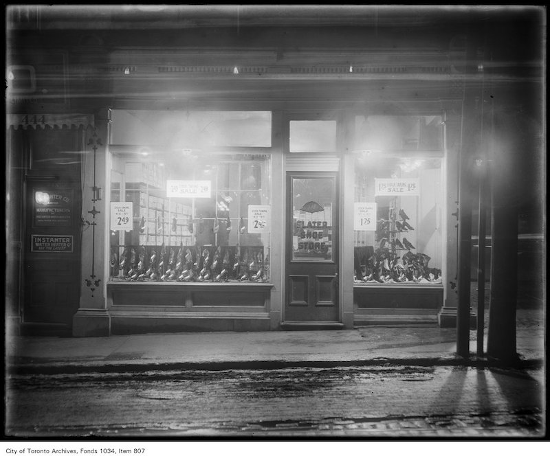 1900? - Window display of high-buttoned boots and shoes at Slater Shoe Store, 448 Yonge Street