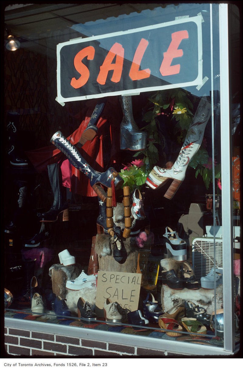 1975 - June 4 - View of shoe store window display on the west side of Yonge Street, north of Wellesly