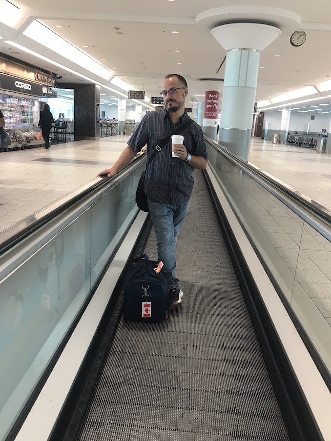 Nelson Caetano - Enjoying a hot cup of coffee while travelling.