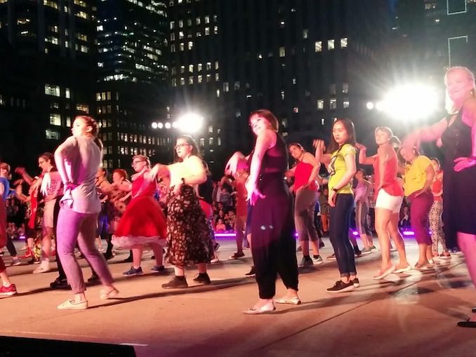 A night-time performance of Sylvain Émard’s Le Grand Continental at Toronto’s Luminato Festival. I was one of 14 pro dancers who supported 200+ community performers over 4 months to dance 30 minutes of choreography in Nathan Philips Square last June. It was epic.