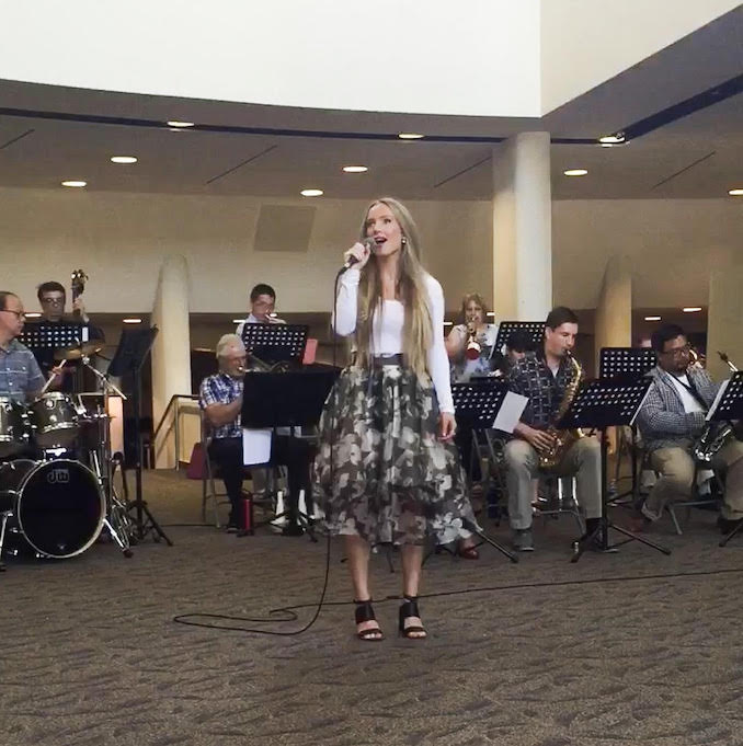 Jaclyn Genovese - Not a lot of people know this about me, but in University, I majored in classic music/opera singing. I have always and will always make music an on going passion and as much of a priority in my life as possible. Here's a pic of me singing with my orchestra!