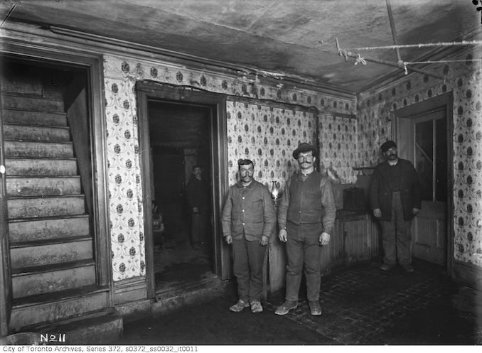 1911 - January 29 - Slum interior, occupied - 318 King Street East