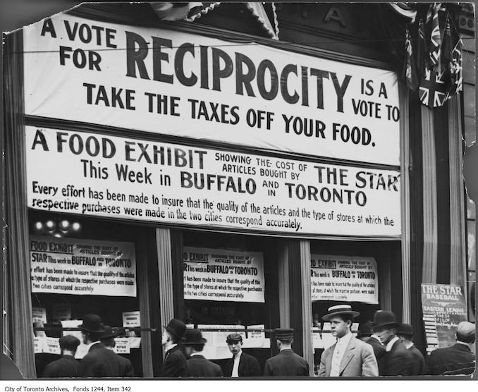 1911 - Signs in window of the Toronto Star building, King Street West