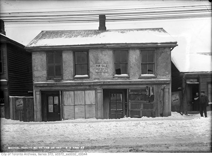 1912 - February 23 - Old building on King Street East near St. Lawrence