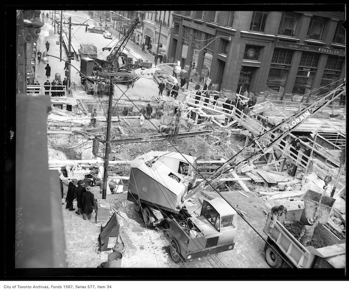 1950 - March 18 - Road work, Yonge Street at King Street