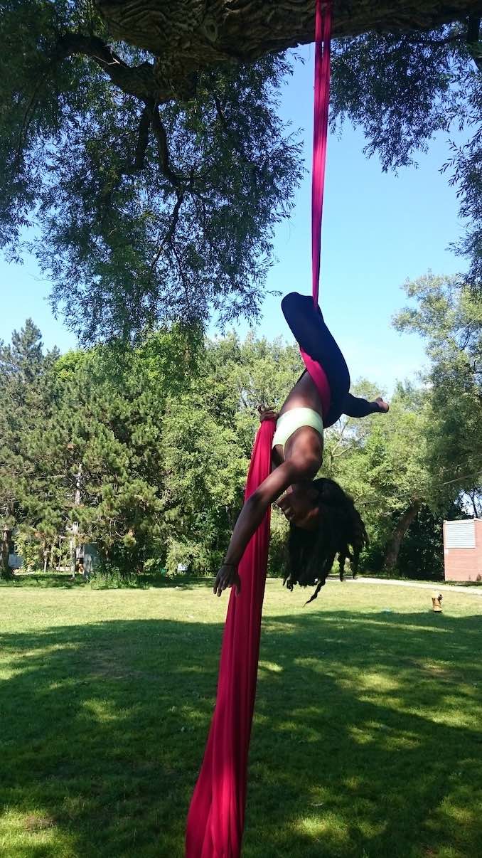 Hanging on some silks in an oak tree on Wards Island. Toronto Island.