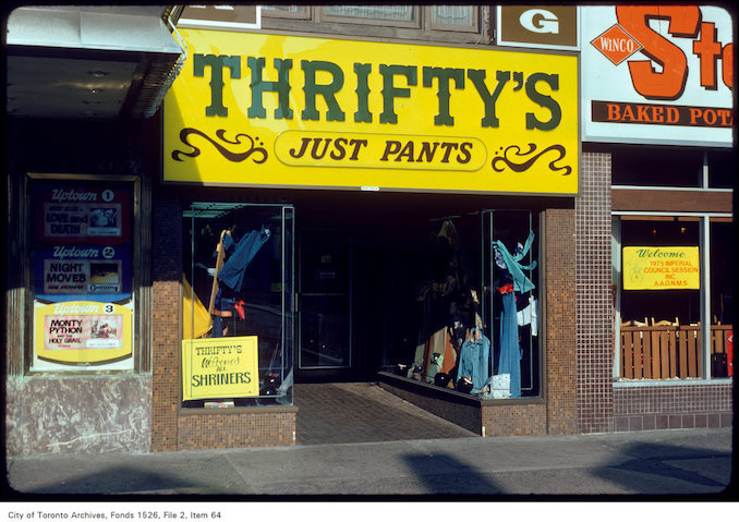 1975 - July 1 - View of Thrifty's store front and window display on west side of Yonge Street, south of Bloor Street