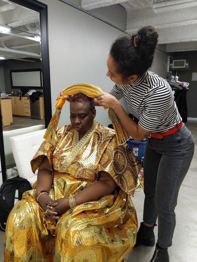 This is me carefully placing a headpiece on Rhoma Spencer at a photoshoot for Aluna Theatre’s The Solitudes Photo: Tanja-Tiziana