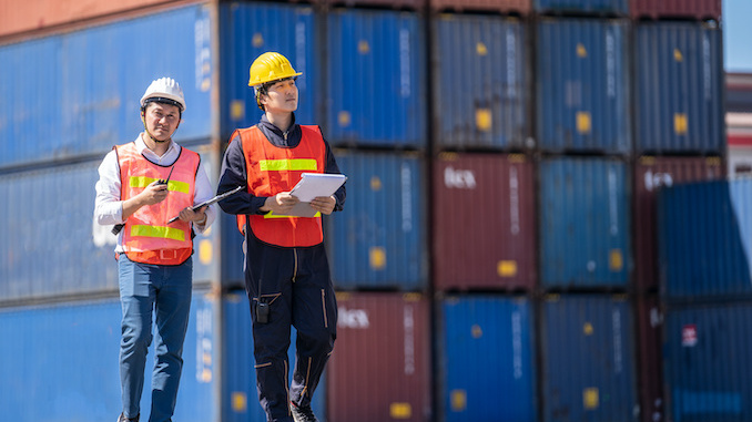 Logistics Engineer Control At The Port, Loading Containers For Trucks 