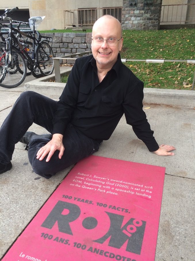  never got to work at the ROM, but my novel Calculating God was set there, and, as part of the Museum’s celebration of its 100th birthday, they put a placard in the sidewalk our front of the Planetarium commemorating that fact.