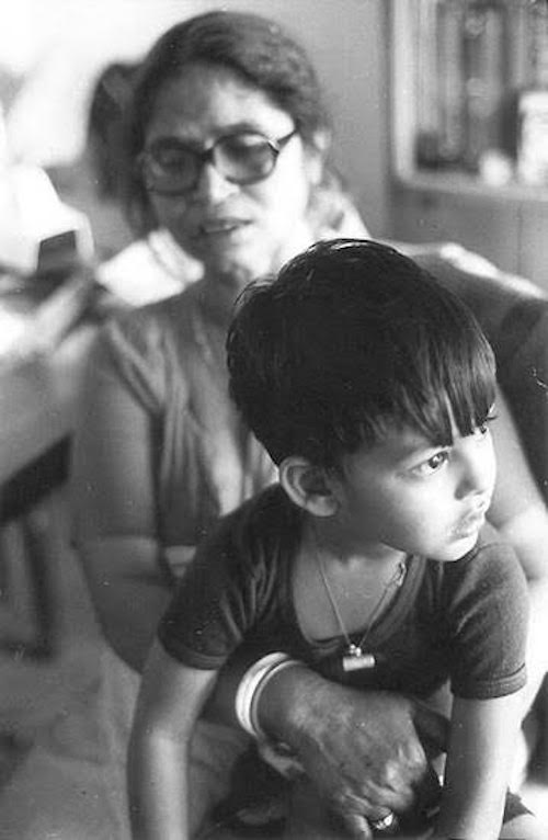 Vikram listening to stories, sitting on his Grandmother's lap - New Delhi, India