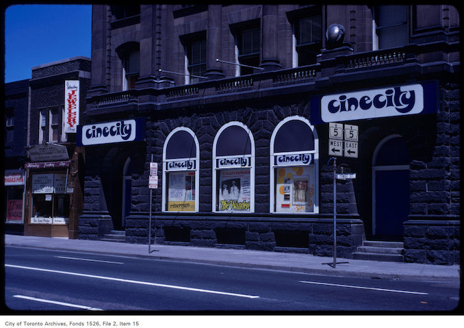 1970 - View of side window display of Cinecity at Yonge and Charles Street East