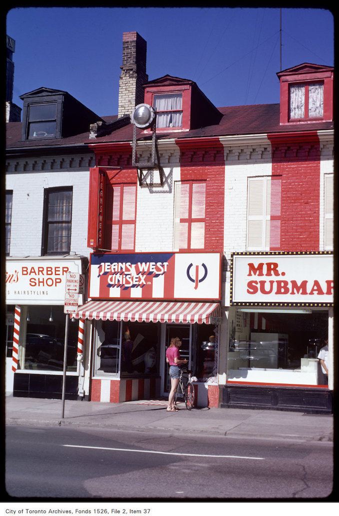 1971 - View of stores on the west side of Yonge Street, south of Irwin Street