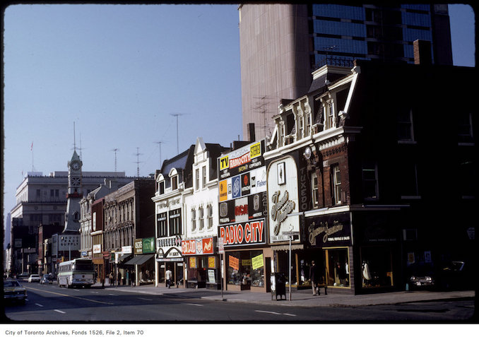 1974 - View of shops on the west side of Yonge Street at Breadalbane