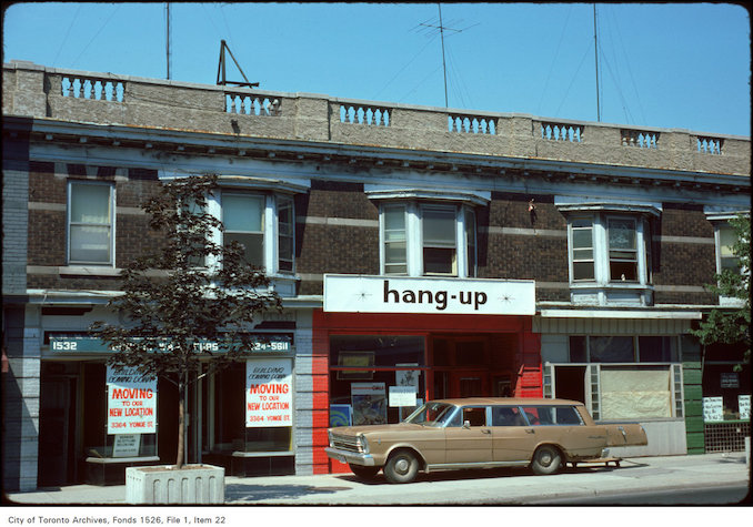 1974 - View of storefronts on the west side of Yonge Street, between Heath and Delisle Avenue 
