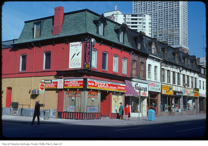 1975 - View of pizza place on the west side of Yonge Street, just north of Wellesley