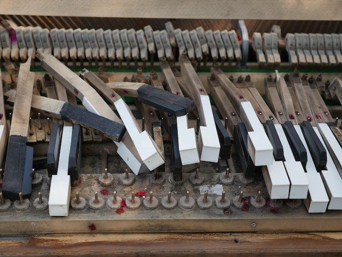 Photo of an abandoned upright piano left on the street taken during one of my neighbourhood walks.